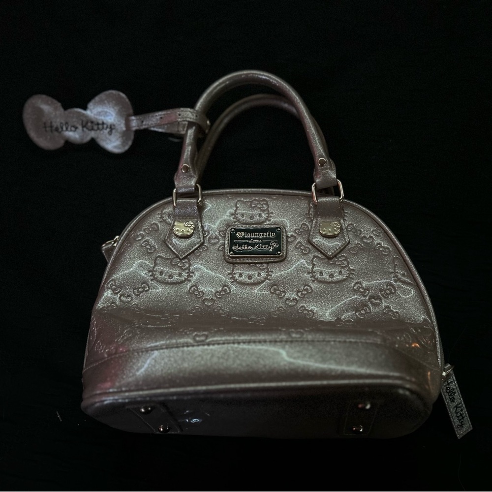 Hello Kitty gold hand bag with Embossed Design